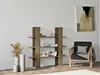 A modern living room scene with a bookshelf, chair, and artwork. Anteprima dell’immagine prodotto