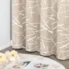 Curtains are shown hanging near a window, with flowers and a book on a rug in the foreground. Produktbild-Vorschau