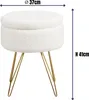 A white sherpa ottoman with gold hairpin legs, shown with dimensions indicated. Náhled obrázku produktu