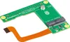 A green circuit board with electronic components and an orange ribbon cable, likely an adapter for a Raspberry Pi. Anteprima dell’immagine prodotto