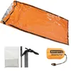 An emergency sleeping bag and its accessories are laid out on a white background. Podgląd zdjęcia produktu