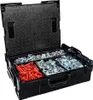 A black toolbox with various fasteners inside, including red wall plugs and silver metal clips. Podgląd zdjęcia produktu