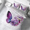 A bedding set with a butterfly and floral design is displayed on a bed. Produktbild-Vorschau