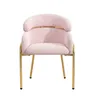 A pink velvet chair with gold metal legs is shown against a white background. Produktbild-Vorschau