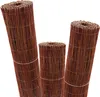 Three rolled-up privacy screens made of natural materials. Produktbild-Vorschau