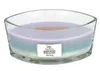 A layered candle in a glass container. Náhled obrázku produktu