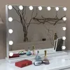 A makeup mirror with lights on a vanity. Produktbild-Vorschau