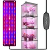 A grow light panel and a multi-tiered plant shelf with plants under the grow light. Náhľad obrázku produktu