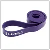 A rolled-up purple exercise band with the brand name "HMS" printed on it. Produktbild-Vorschau