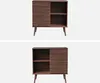 A wooden sideboard with a slatted sliding door and two shelves, shown from the front. Anteprima dell’immagine prodotto