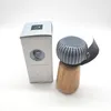 A product box and a grinder are shown against a white background. Podgląd zdjęcia produktu