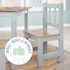 A close-up of a child's table and chair set, with a circular graphic overlay. Produktbild-Vorschau