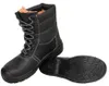 A pair of black winter work boots, one standing and one lying on its sole, against a white background. Produktbild-Vorschau