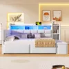 A white daybed with built-in shelves and LED lighting, decorated with pillows and a throw blanket. Produktbild-Vorschau