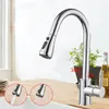 A chrome kitchen faucet with a pull-out spray head is shown on a wooden countertop, with inset images demonstrating water flow modes. Náhľad obrázku produktu