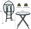 A folded and an unfolded view of a small round bistro table with a glass top and black metal frame, with dimensions and weight information displayed. Produktbild-Vorschau