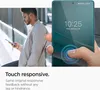 A man is looking at his phone, while a hand is shown touching a phone screen with a fingerprint scanner. Náhľad obrázku produktu