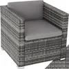 A single gray rattan armchair with gray cushions. Produktbild-Vorschau