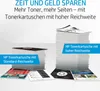 Two stacks of paper, one labeled 'Standard-Reichweite' and the other 'hoher Reichweite', with promotional text above. Produktbild-Vorschau