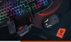A gaming headset and mouse are placed on a keyboard and mousepad. Anteprima dell’immagine prodotto