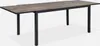 A dining table with a wood-like top and black metal legs, shown from a slightly elevated angle. Anteprima dell’immagine prodotto