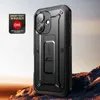 A black phone case with a kickstand is shown in a rugged, mountainous environment. Produktbild-Vorschau