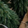 Close-up view of artificial Christmas tree branches. Náhled obrázku produktu