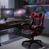 A gaming chair is shown in a modern gaming setup with multiple monitors and a desk. Produktbild-Vorschau