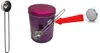 A coffee tin with a measuring spoon attached and a red arrow pointing to a magnet. Produktbild-Vorschau