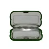 An open green hand warmer with a silver interior. Produktbild-Vorschau