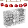 Christmas ornaments are displayed hanging from a clothesline and in a clear plastic box. Voir les images du produit