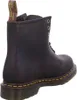 A close-up side view of a brown leather boot. Voir les images du produit