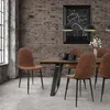 A dining room scene with a table and chairs. Náhľad obrázku produktu