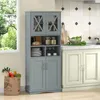 A kitchen scene with a gray cabinet and a grocery bag filled with produce. Produktbild-Vorschau