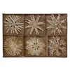 A set of six straw star ornaments arranged in a cardboard box with six compartments. Produktbild-Vorschau