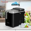 A black ice maker is displayed on a countertop with a drink and ice cubes. Náhled obrázku produktu