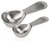Two stainless steel measuring spoons are shown on a white background. Produktbild-Vorschau
