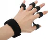 A hand wearing a black finger and wrist exerciser. Náhled obrázku produktu