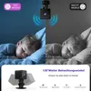 Split image showing a child sleeping in a room, with one side depicting day mode and the other night mode, and a mini camera shown below. Produktbild-Vorschau