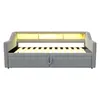A grey upholstered daybed with a slatted mattress base and integrated LED lighting in the headboard. Voir les images du produit