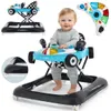 A baby sitting in a blue and black baby walker designed to look like a race car, with a remote control shown separately. Náhled obrázku produktu