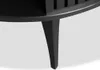 A close-up view of the leg of a black coffee table. Produktbild-Vorschau