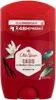 A red Old Spice Oasis deodorant stick with floral and vanilla bean imagery. Produktbild-Vorschau