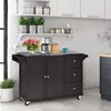 A kitchen island cart with a stainless steel countertop is shown in a kitchen setting. Náhľad obrázku produktu