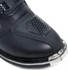 A close-up view of the toe of a black motorcycle boot. Produktbild-Vorschau