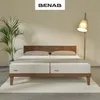 A bedroom scene with a bed, plant, and floor lamp. Produktbild-Vorschau