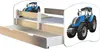 A child's bed with a pull-out drawer and tractor graphics on the sides. Produktbild-Vorschau