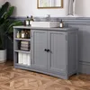 A gray bathroom vanity with a sink and faucet, stocked with toiletries and towels, set against a gray paneled wall and a wooden floor. Voir les images du produit