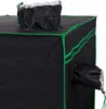 A close-up view of a black grow tent with green trim and silver accents on the vents. Produktbild-Vorschau