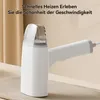 A white garment steamer is shown on a textured surface with a blurred background. Produktbild-Vorschau